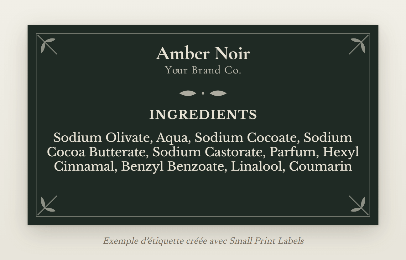 Exemple d'étiquette de savon sombre, lettres crème sur vert profond avec des coins botaniques : savon Amber Noir et sa liste des ingrédients avec quatre allergènes parfumants, 70 × 40 mm