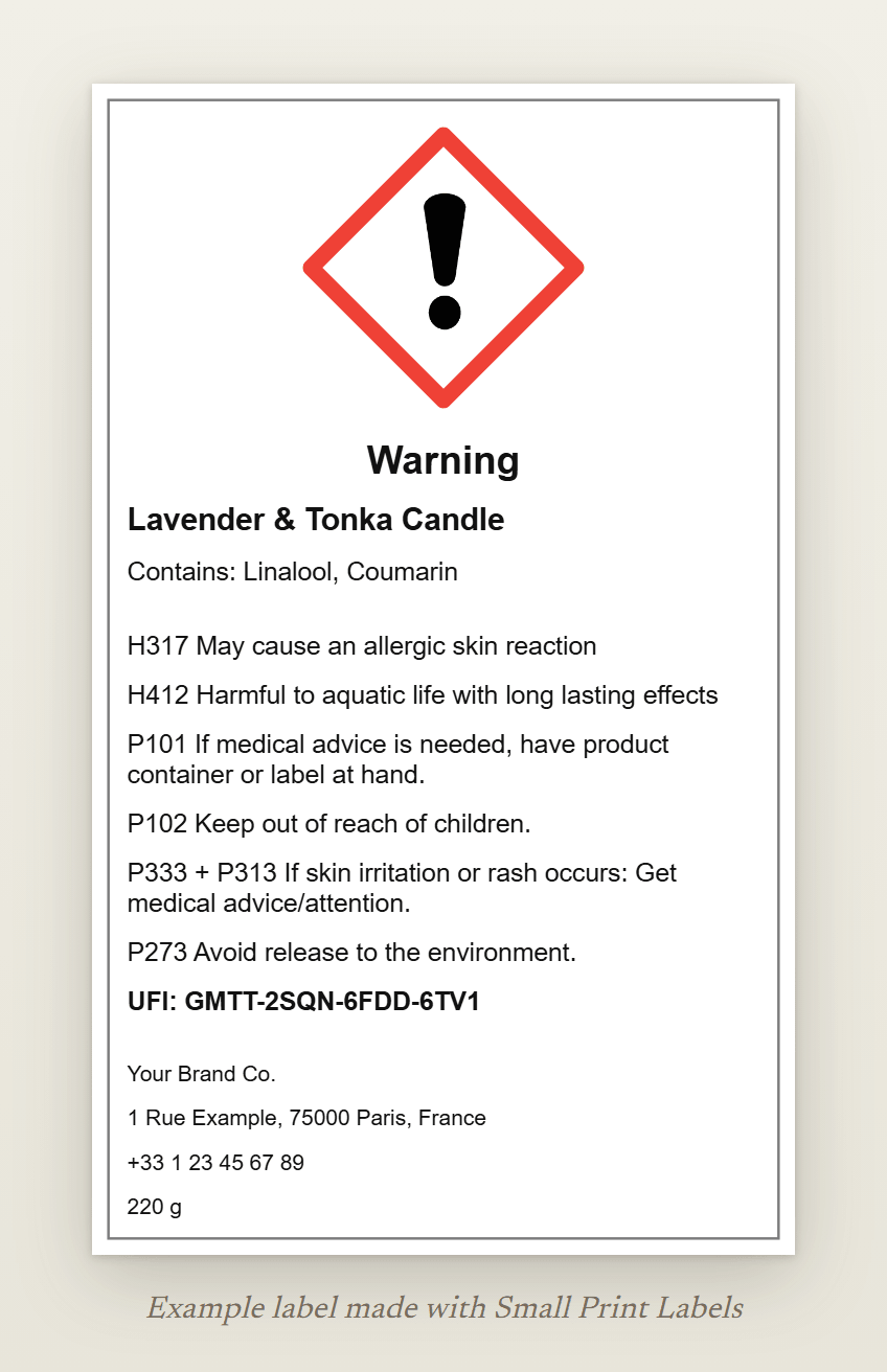 Example candle label with the GHS07 exclamation mark and the signal word Warning: Lavender & Tonka Candle, Contains: Linalool, Coumarin, H317 and H412, four precautionary statements, a UFI and the supplier details, 60 × 100 mm