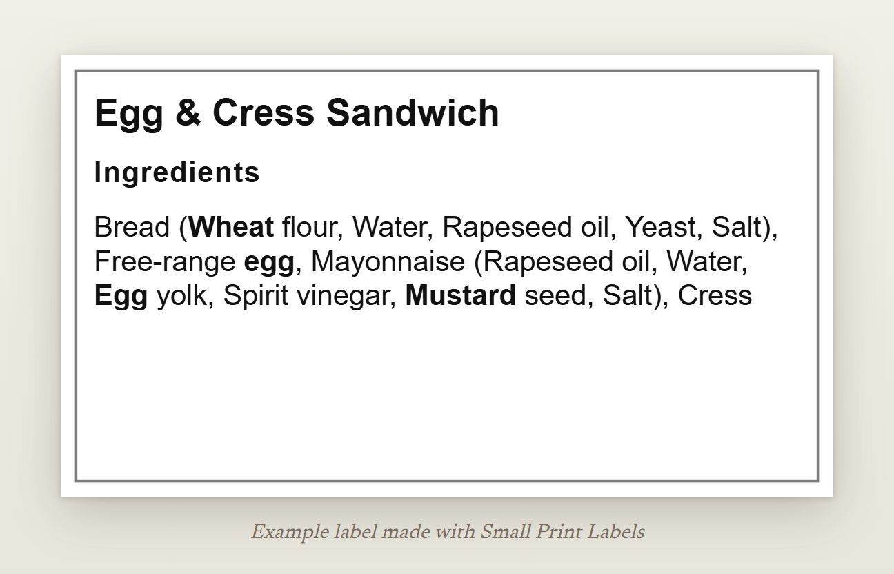 Example Natasha's Law sandwich label: Egg & Cress Sandwich with wheat, egg and mustard in bold in the bread's and the mayonnaise's own ingredient lists, 70 × 40 mm