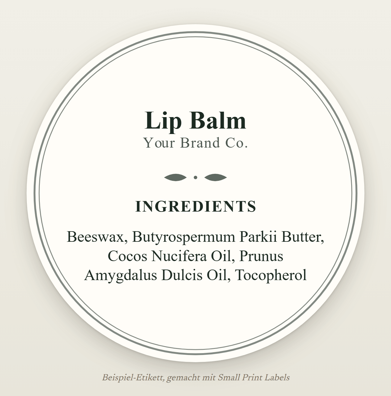 Beispiel-Etikett für eine runde Lippenbalsamdose, cremefarben mit doppeltem Rahmen: Lip Balm und seine INCI-Liste mit fünf Bestandteilen, 51 mm rund
