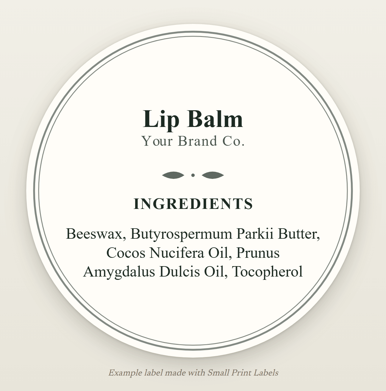 Example round lip balm tin label in cream with a double frame: Lip Balm and its five-ingredient INCI list, 51 mm round