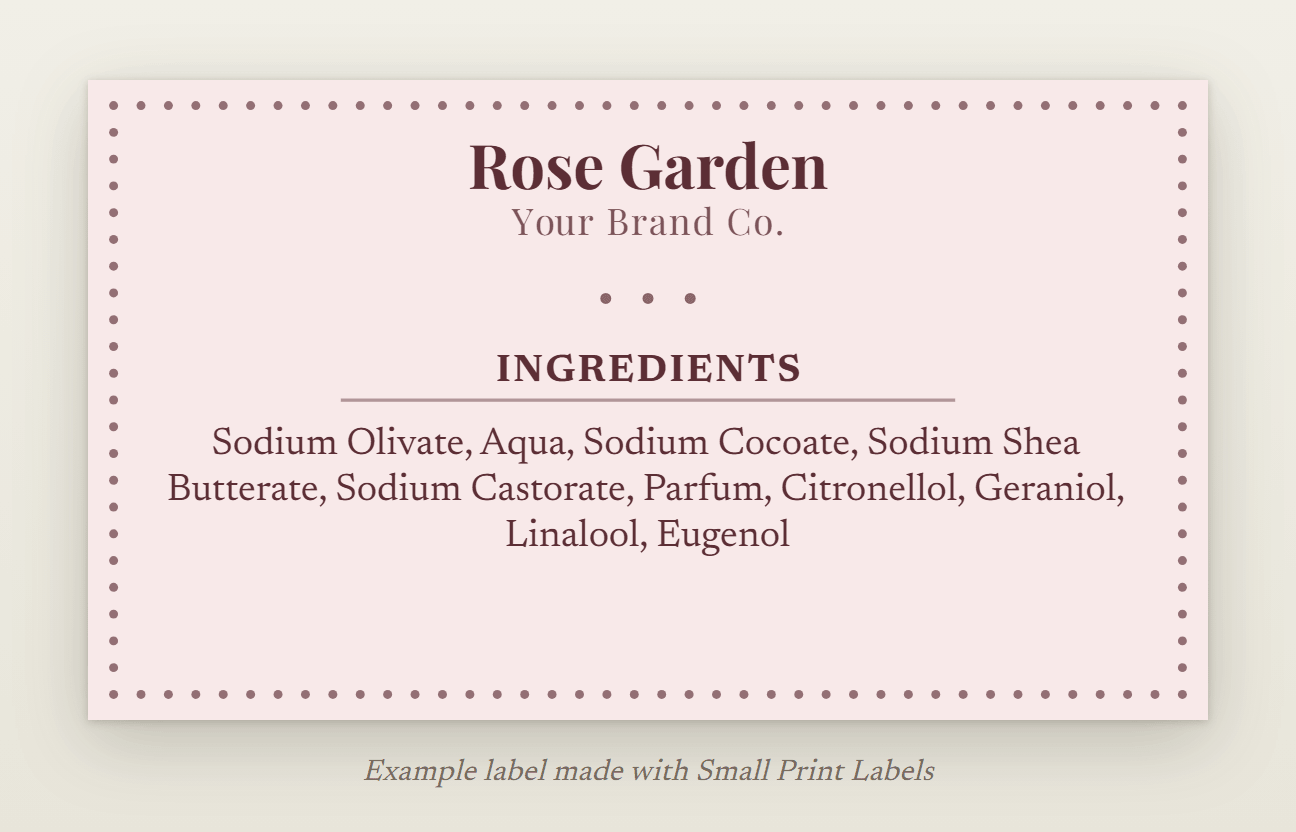 Example UK soap label in blush pink with a beaded border: Rose Garden soap and its ingredient list with Parfum and four fragrance allergens, 70 × 40 mm