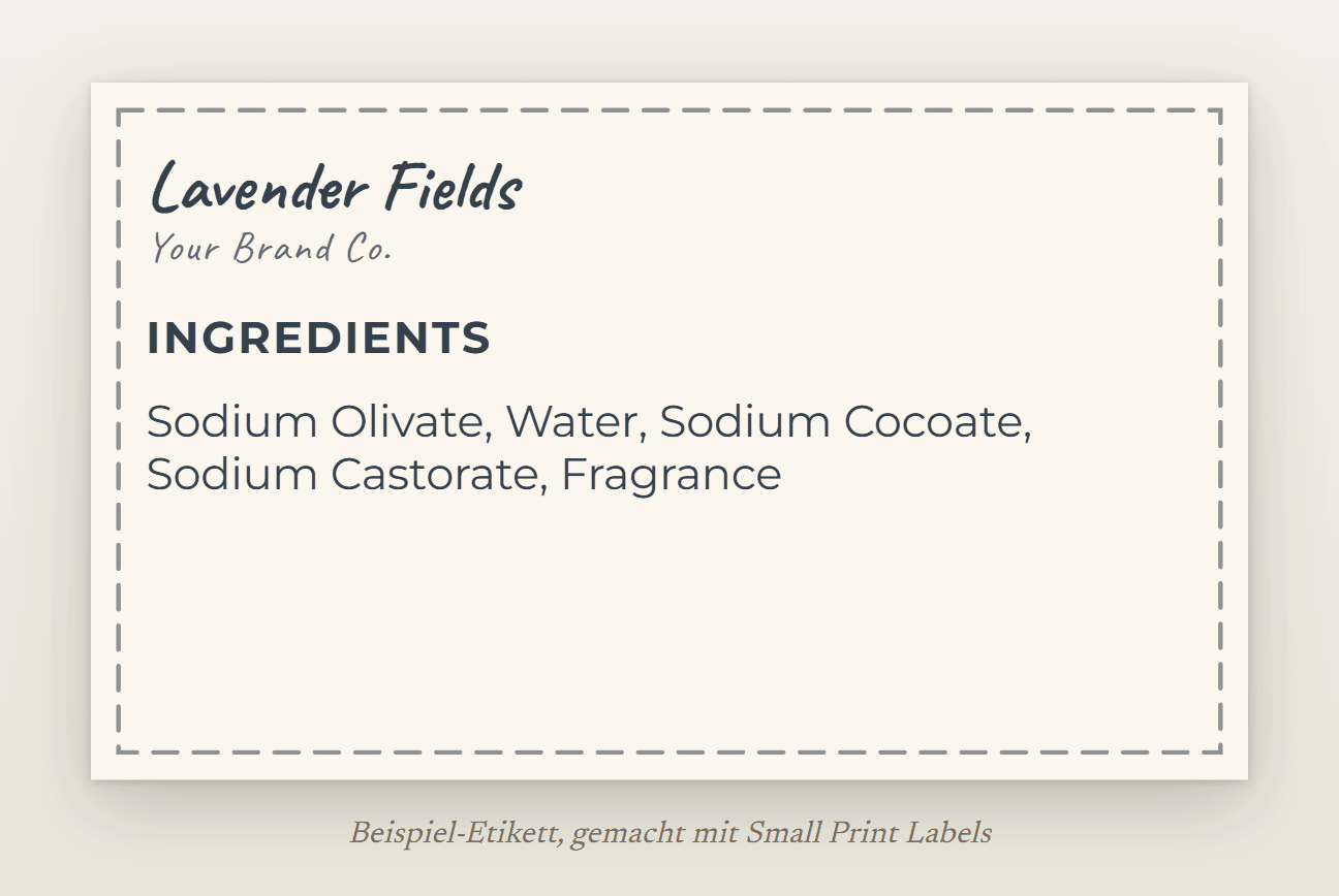 Beispiel-Etikett für eine Seife für die USA, cremefarben mit Steppnaht: Lavender Fields und die Liste der Bestandteile mit US-Namen und Fragrance, 63 × 38 mm
