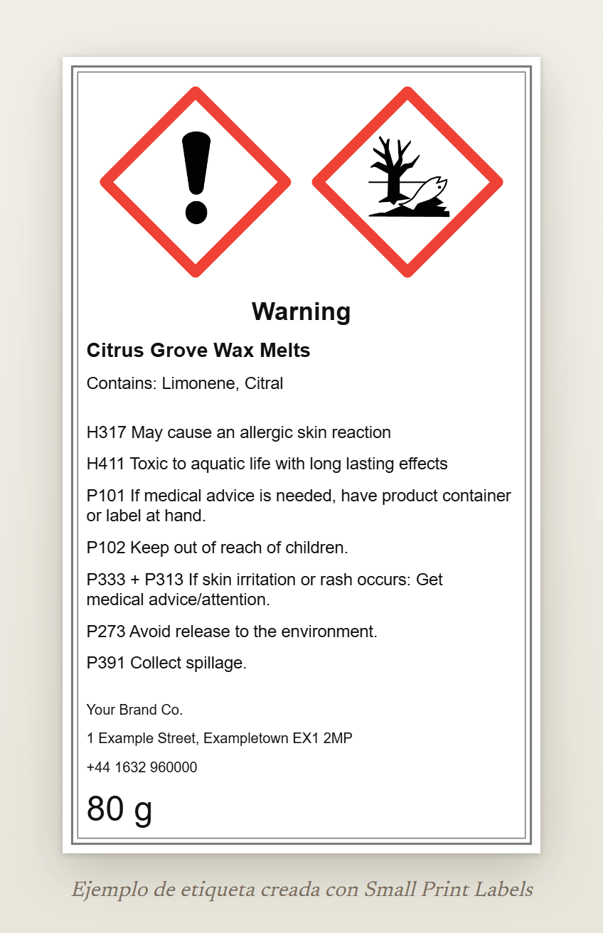 Ejemplo de etiqueta de wax melts para el Reino Unido, en inglés, con los pictogramas GHS07 y GHS09 y la palabra de advertencia Warning: Citrus Grove Wax Melts, Contains: Limonene, Citral, H317 y H411, cinco consejos de prudencia y un proveedor británico, 60 × 100 mm
