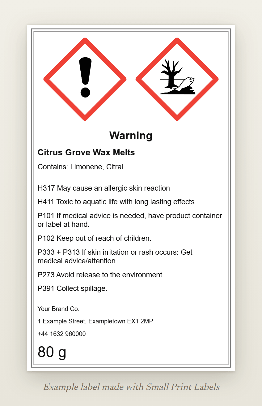 Example UK wax melt label with the GHS07 and GHS09 pictograms and the signal word Warning: Citrus Grove Wax Melts, Contains: Limonene, Citral, H317 and H411, five precautionary statements and a UK supplier, 60 × 100 mm