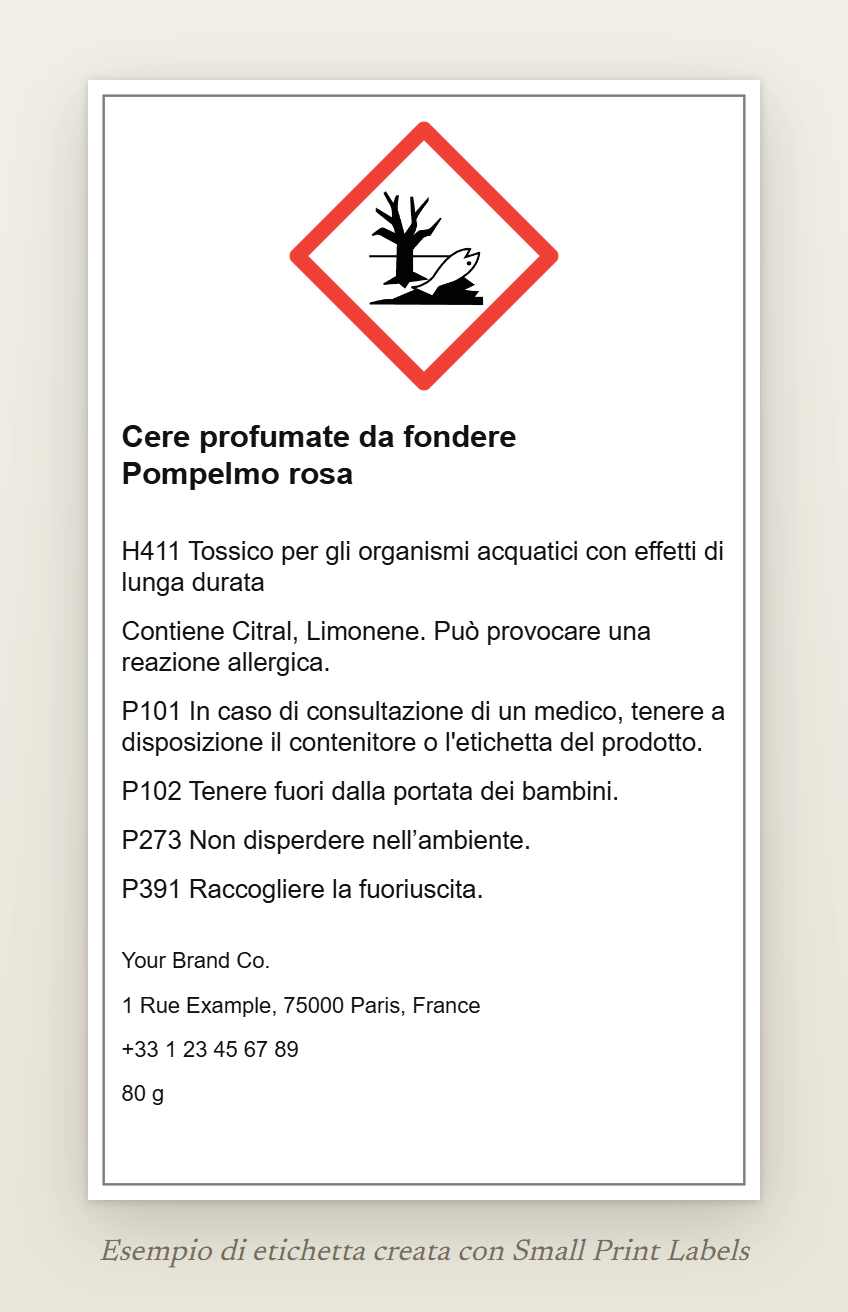 Esempio di etichetta per cere profumate da fondere con il pittogramma dell'ambiente GHS09: Cere profumate da fondere Pompelmo rosa, H411, la riga EUH208 che indica Citral e Limonene, quattro consigli di prudenza e i dati del fornitore, 60 × 100 mm