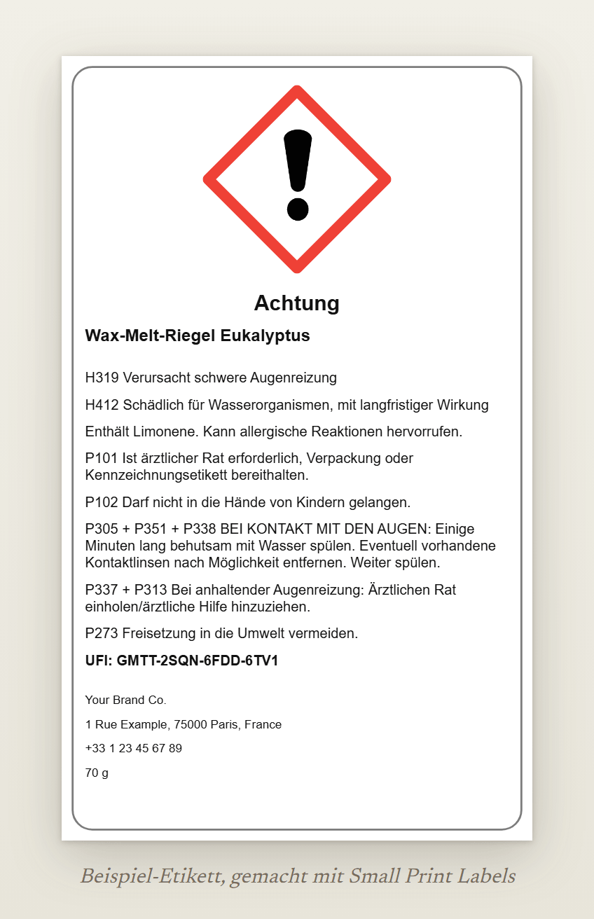 Beispiel-Etikett eines Wax-Melt-Riegels mit dem Ausrufezeichen GHS07 und dem Signalwort Achtung: Wax-Melt-Riegel Eukalyptus, H319 und H412, die EUH208-Zeile, fünf Sicherheitshinweise, ein UFI und die Angaben zum Lieferanten, 60 × 100 mm