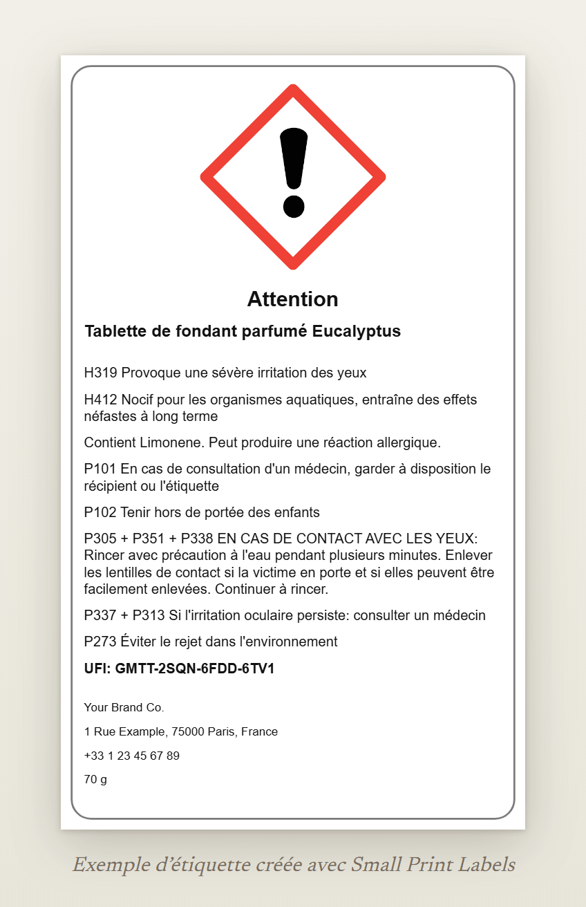 Exemple d'étiquette de tablette de fondant parfumé avec le point d'exclamation SGH07 et la mention d'avertissement Attention : Tablette de fondant parfumé Eucalyptus, H319 et H412, la ligne EUH208, cinq conseils de prudence, un UFI et les coordonnées du fournisseur, 60 × 100 mm