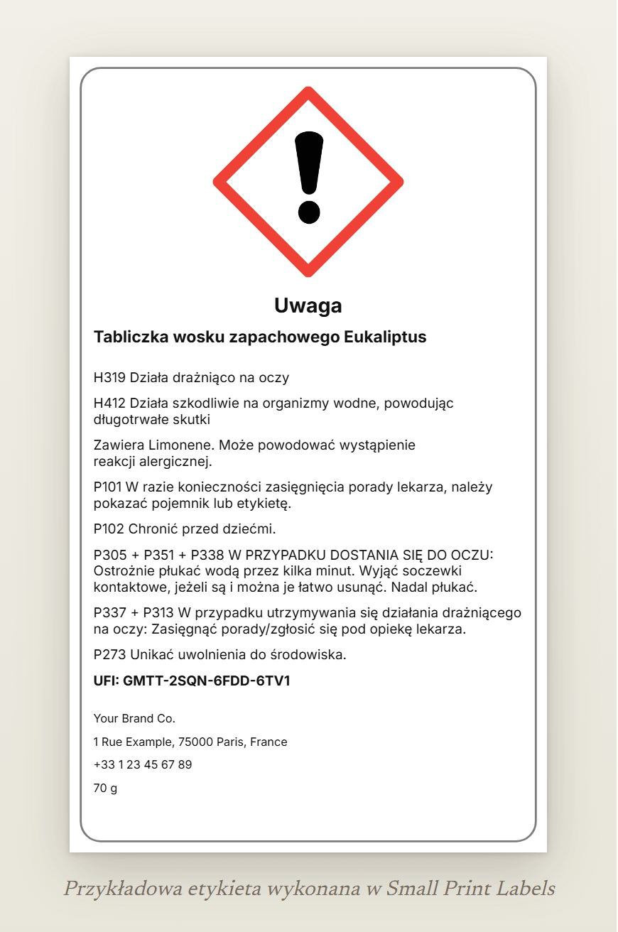 Przykładowa etykieta tabliczki wosku zapachowego: piktogram GHS07 (wykrzyknik), hasło ostrzegawcze Uwaga, „Tabliczka wosku zapachowego Eukaliptus”, H319 i H412, wiersz EUH208, pięć zwrotów wskazujących środki ostrożności, UFI i dane dostawcy, 60 × 100 mm